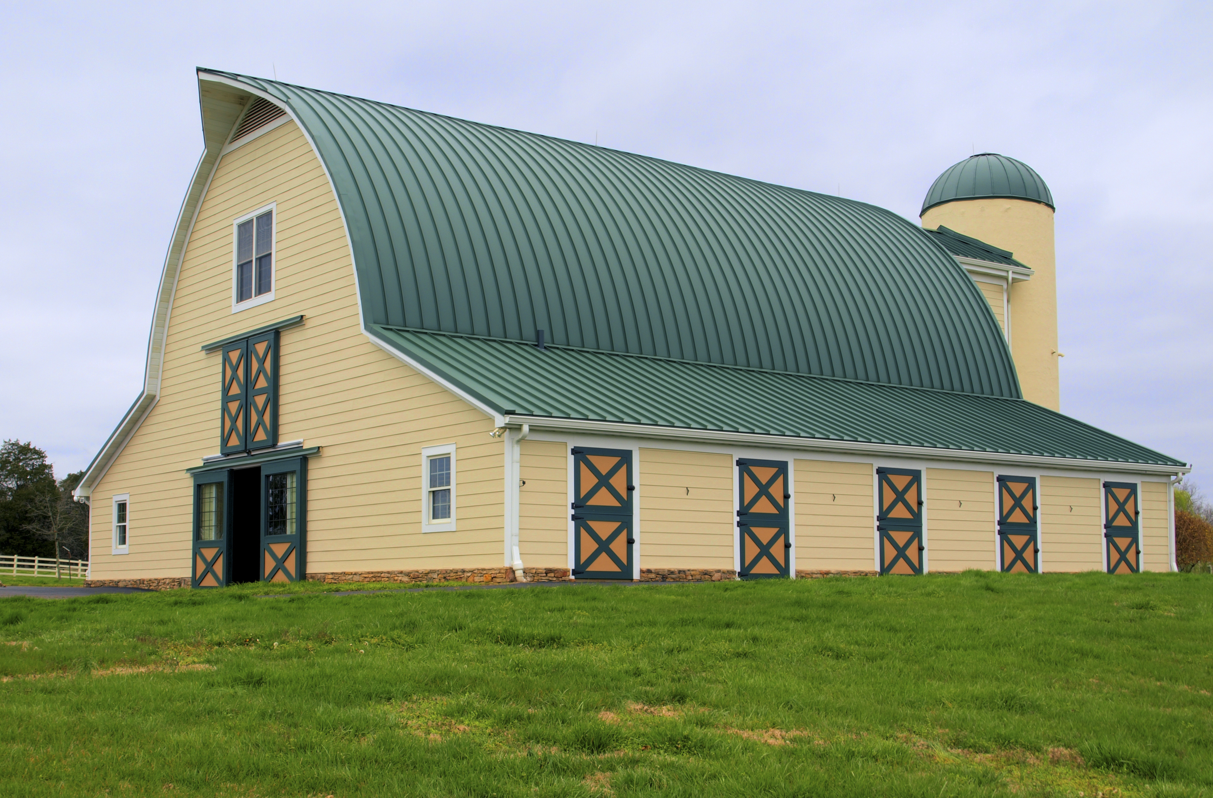 Barn with green metal roof